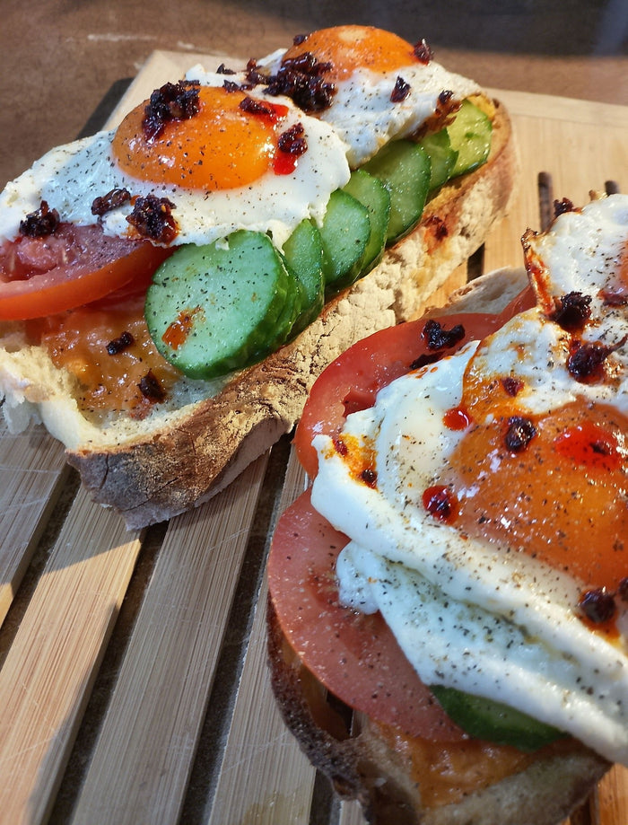 North of the Border Toast on Caramelized Onion Cracked Black Pepper Sourdough